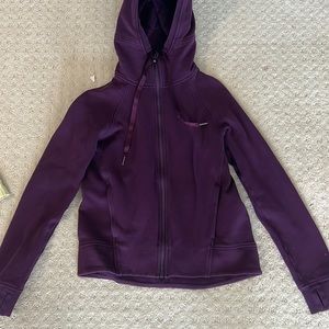 This is a lululemmon purple zip up. It’s in an OK condition.